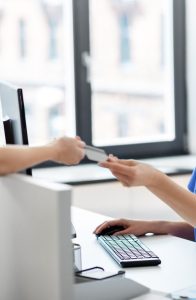 patient paying for dental treatments