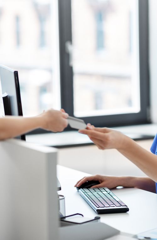 patient paying for dental treatments