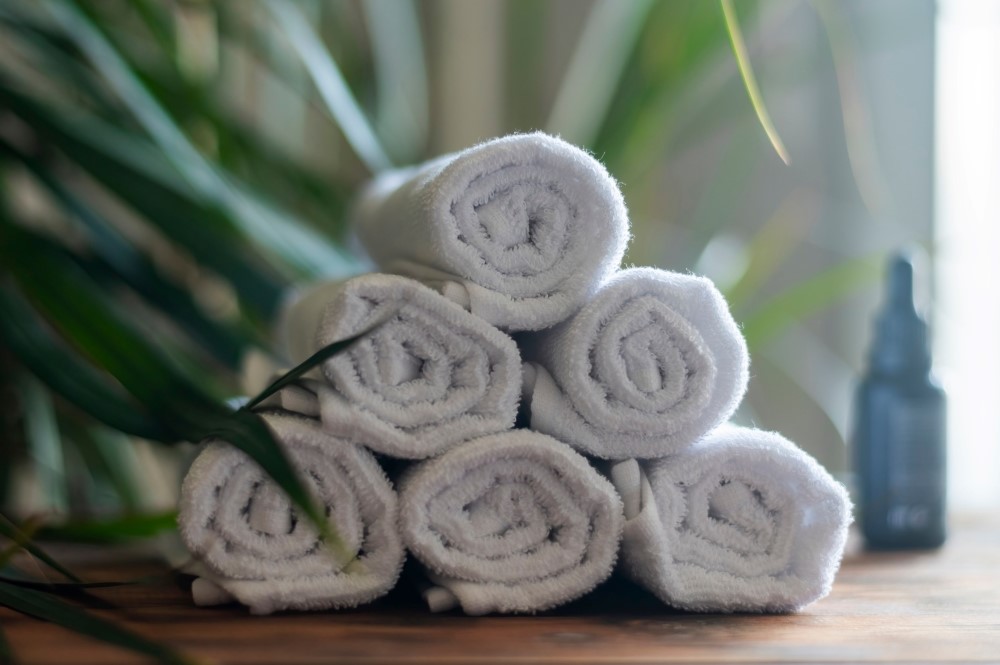 white folded towels