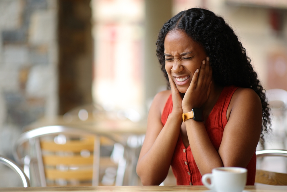woman has tmj pain