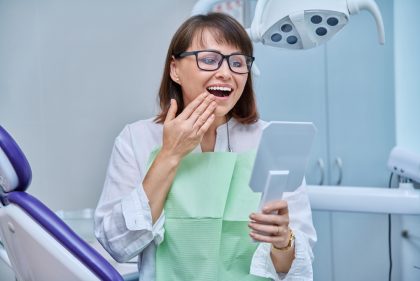 middle-aged woman sees new smile